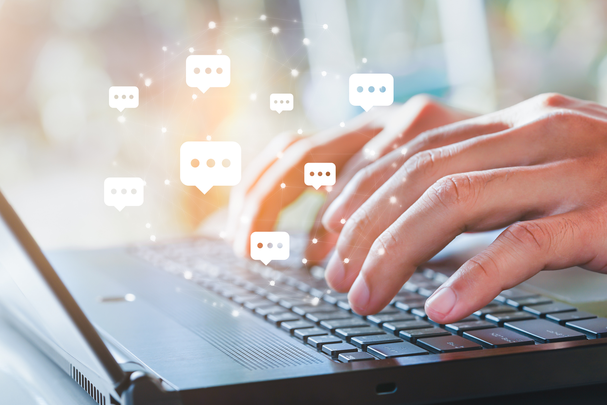 Live chat chatting and social network concepts, Close up hands typing on keyboard laptop with chat box icons